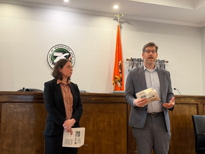 Suzanne Goldberg (L.) and Noah Levine (R.) explained the process of a comprehensive plan. 