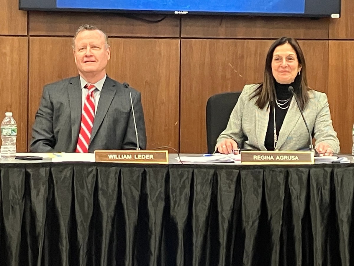 William Leder, board president (L.), and Regina Agrusa, superintendent (R.), at a previous school board meeting.