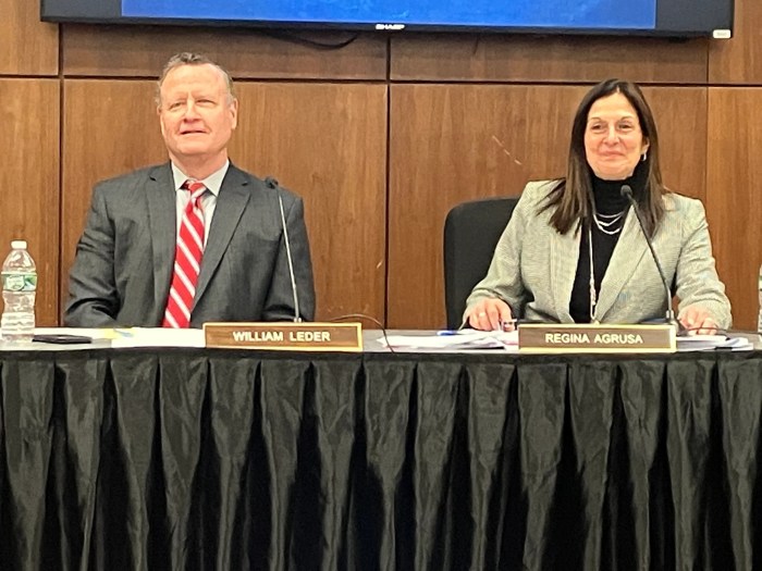 William Leder, board president (L.), and Regina Agrusa, superintendent (R.), at a previous school board meeting.