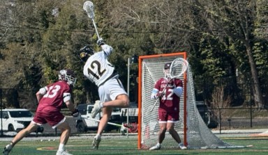 St. Anthony’s senior attacker, Charlie Cacciabaudo, rises up for a shot on goal.
