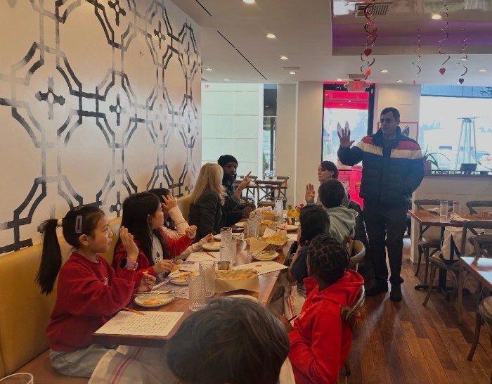 The students were joined by Russell Green, president of the Syosset-Woodbury Chamber of Commerce.