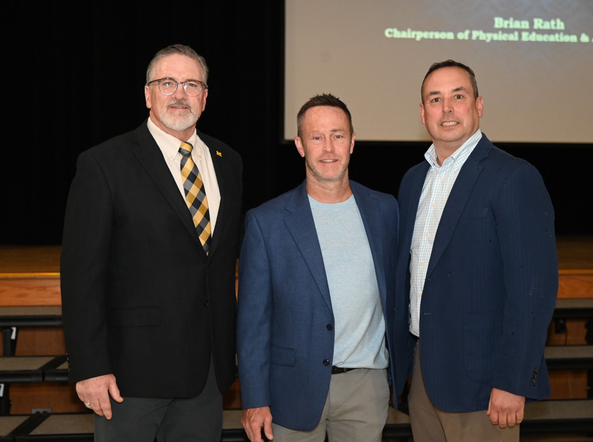 Image 1 (Cover pic) Massapequa School District Athletic Director Matt McLees, Michael Fay, Founder of With Purpose & Brian Rath, Massapequa High School Chairperson of Athletics (Photo by Ed Shin)