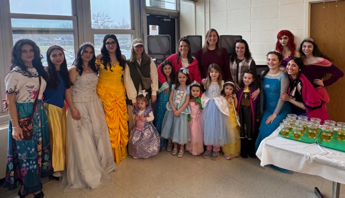 The event featured a breakfast buffet, character meet-and-greets, crafts, a behind-the-scenes tour of the set, and a sneak peek performance of Cinderella.