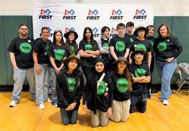 The Carle Place High School FIRST Robotics team team designed, built and programmed their first competition robot to show at the Long Island qualifier.