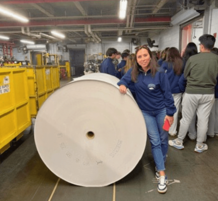 Jericho High School assistant principal Micheala Finlay joined students on a tour of The New York Times printing press.