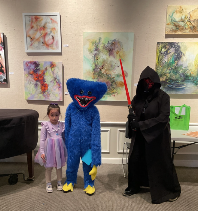 The cosplay contest winners at RosCon were (from L. to R.) Rumi Kang, Huggy Wuggy and Darth Maul.