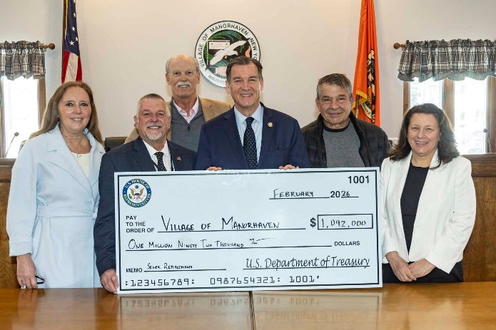 U.S. Rep. Tom Suozzi delivered the Village of Manorhaven funds to upgrade a sewer pipe along with Nassau County Legislature Minority Leader Delia DeRiggi-Whitton and Council Member Mariann Dalimonte.