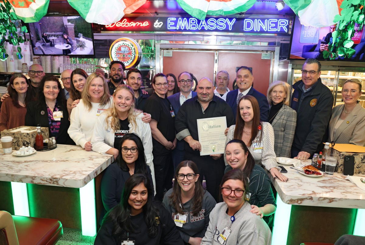 Oyster Bay Town Supervisor Joseph Saladino, St. Joseph Hospital President Joseph Manopella, Nassau County Comptroller Elaine Phillips and Oyster Bay Town officials recognizing Embassy Diner owner Gus Tsiorvas for donating breakfast for 80 frontline workers during aa recent winter storm.