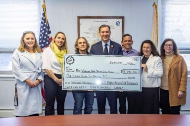 U.S. Rep. Tom Suozzi delivered the Port Washington Water Pollution Control District funds for sewer improvements along with Nassau County Legislature Minority Leader Delia DeRiggi-Whitton and Council Member Mariann Dalimonte.