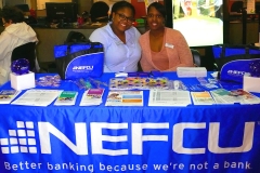 NEFCU sponsor represntatives, (lt to rt) Netia Perry and Ms. Tanisha Stuart, offered friendly and informative information about the services of their company, NEFCU